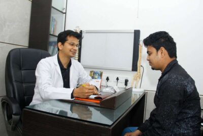 Doctor Treating & Consulting Neuro Patient